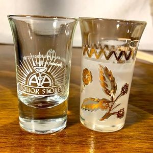 Two vintage shot glasses